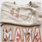 Personalized embroidered multiple names on a keepsake sweatshirt sleeve